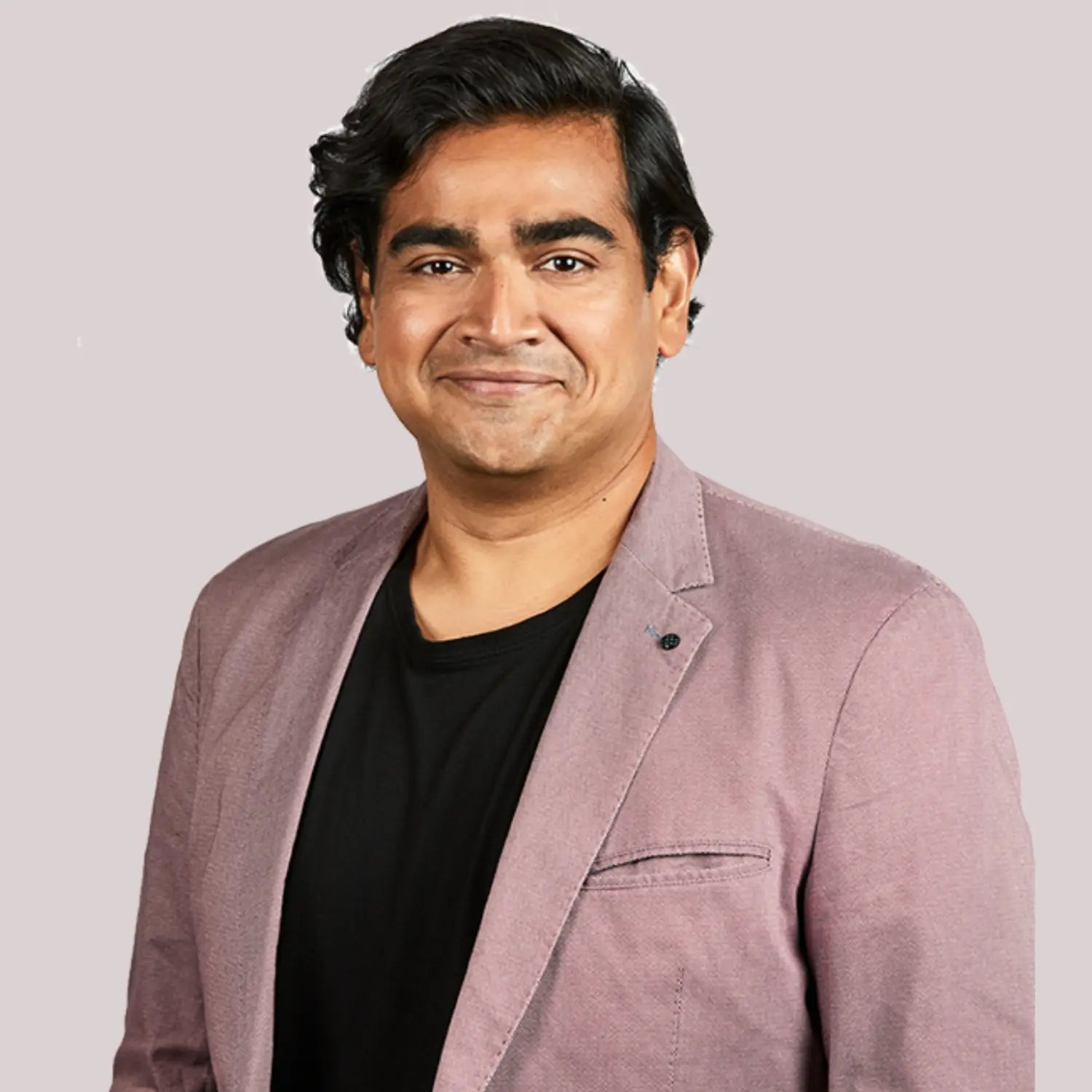 Headshot of comedian Dilruk Jayasinha, popular for his positive and upbeat comedy.